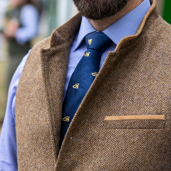 Blue silk tie worn