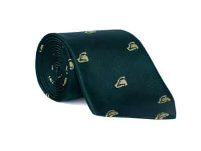 Rolled dark green BASC silk tie featuring a repeating gold BASC logo pattern, displayed against a plain white background.