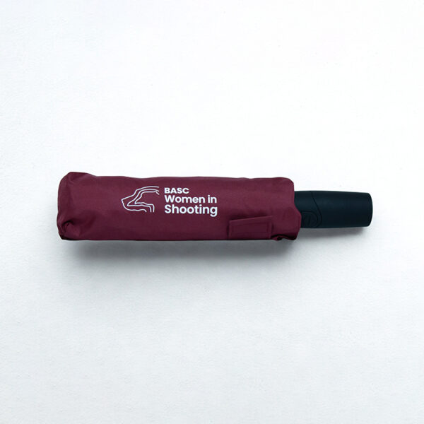 Maroon women in shooting umbrella