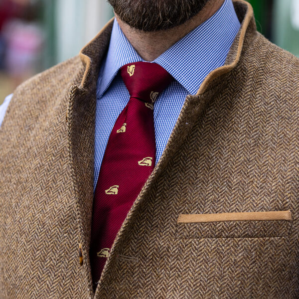 Maroon silk tie close up