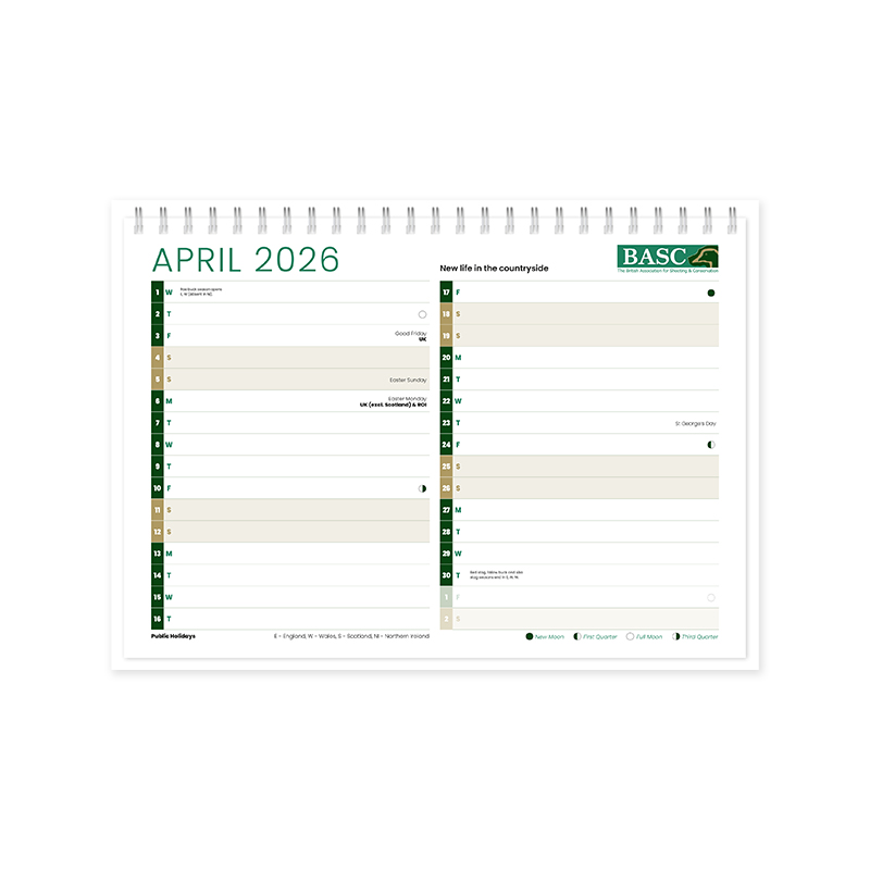 April 2026 calendar spread with dates, public holidays, and moon phases. Includes Good Friday (April 3), Easter Sunday (April 5), Easter Monday (April 6), and St George's Day (April 23). New Moon on April 17 and Full Moon on April 30. Features regional holiday indicators, 'New life in the countryside' text, and BASC logo